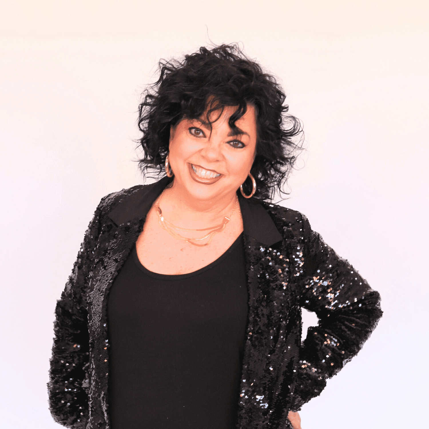 Portrait of Melinda, a professional stylist at Shairon's Salon, showcasing their expertise and style.